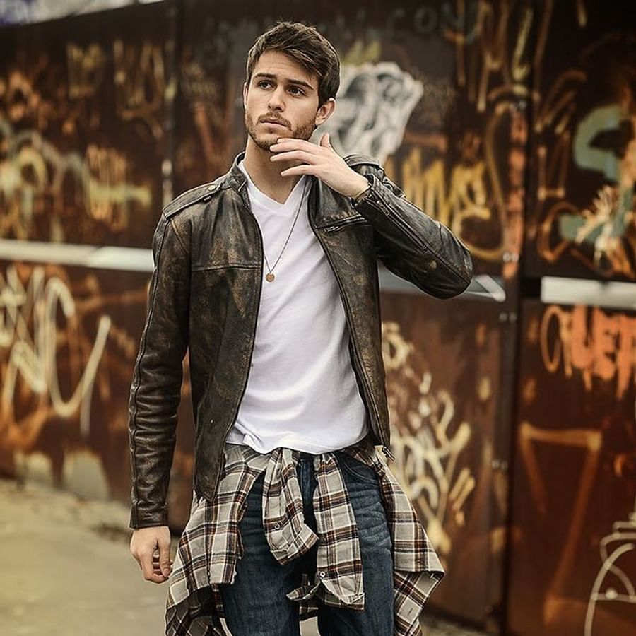 Fashion influencer showcasing modern leather winter outfit